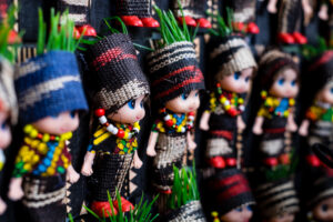 Dolls in T'nalak clothing displayed during the T'nalak Festival in 2019